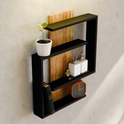 Minimalist wall shelf featuring a plant, books, and stylish decor in a modern home setting.