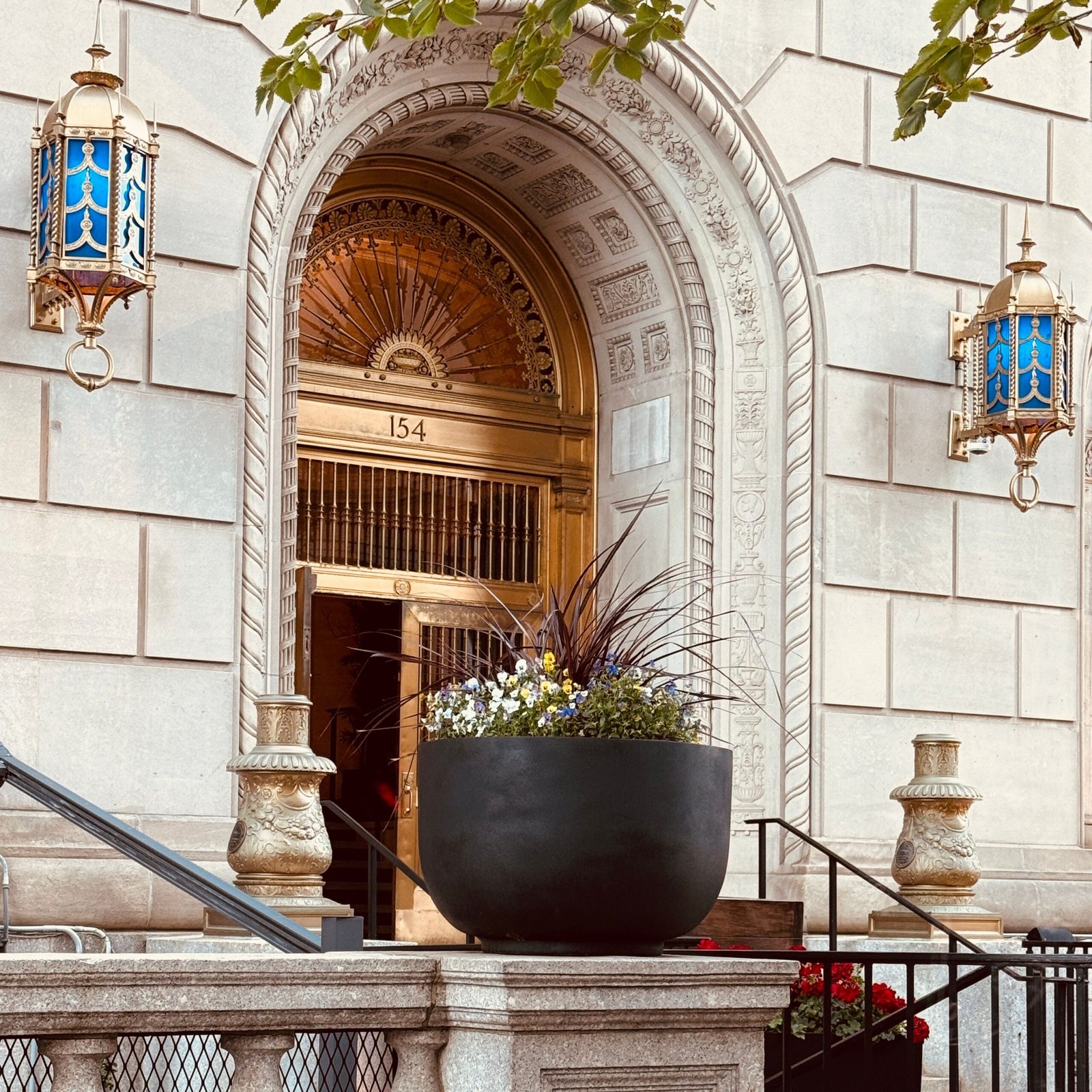pexels-photo-38073174-38073174 Elegant entrance to 154 building, showcasing classic Boston architecture with decorative elements.